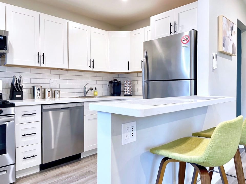 Remodeled Kitchen with quartz counters, and full-sized appliances. 