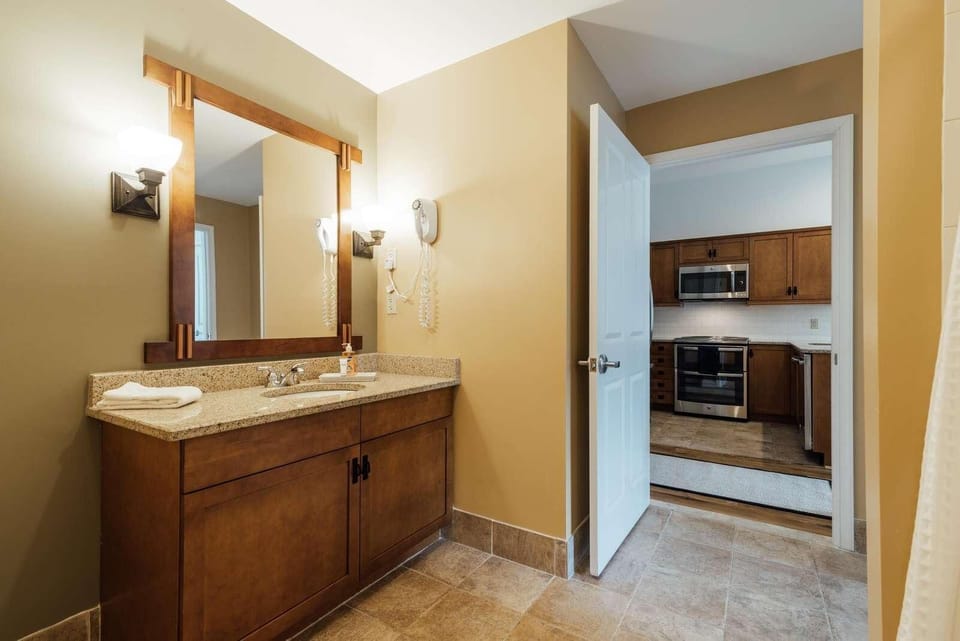 Cozy bathroom retreat with easy kitchen access