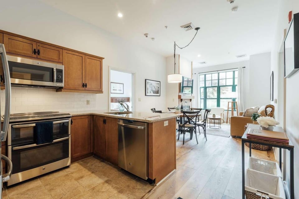Bright, modern kitchen and dining area with city views