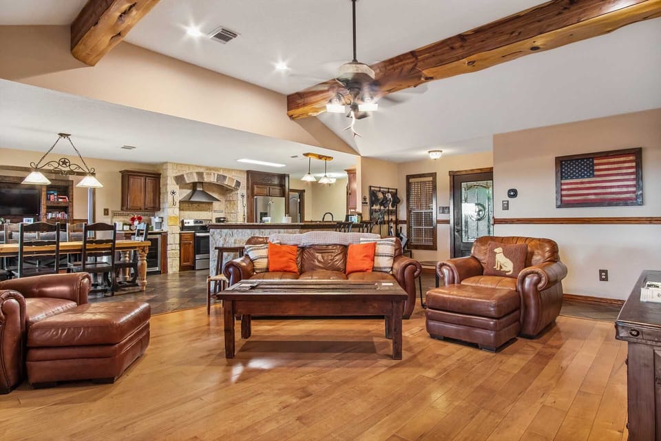 Look at those beamed ceilings and wide-open spaces! The open floor plan and decor at the Retreat make you feel like ranch royalty.
