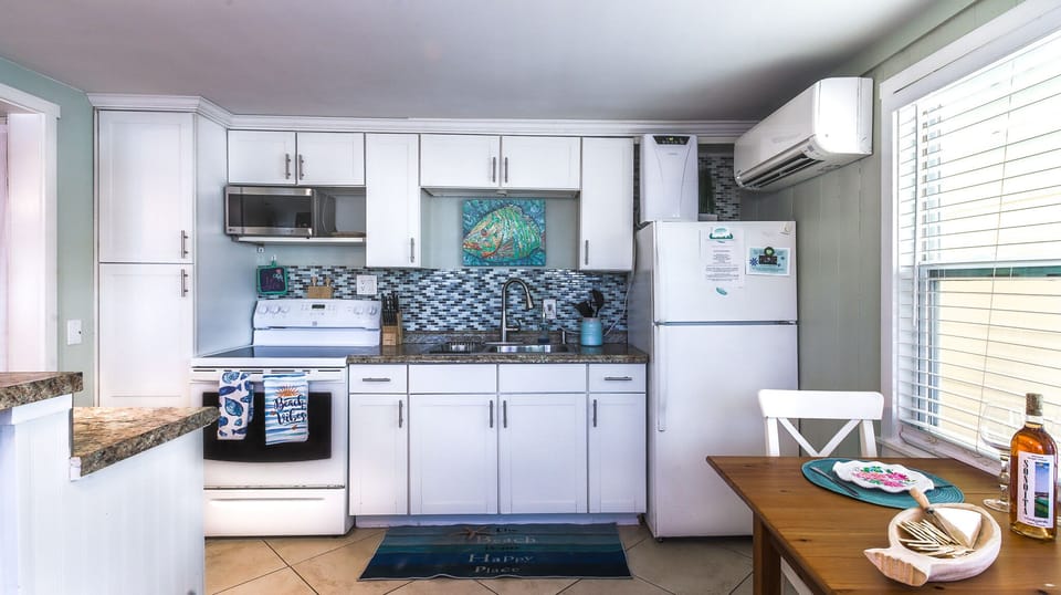 A real kitchen with a real stove. Cook your catch or save it for the grill out front.