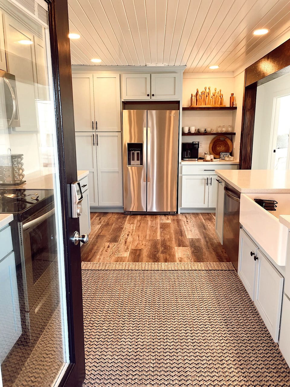 Front door covered entrance into kitchen.