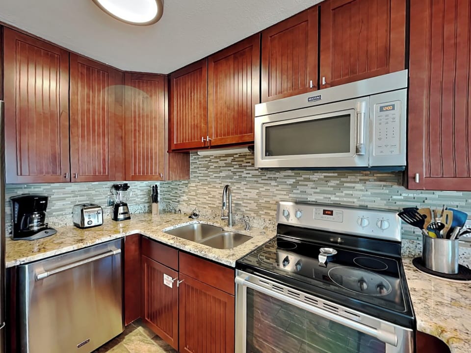 Fully Equipped Kitchen with Stainless Steel Appliances