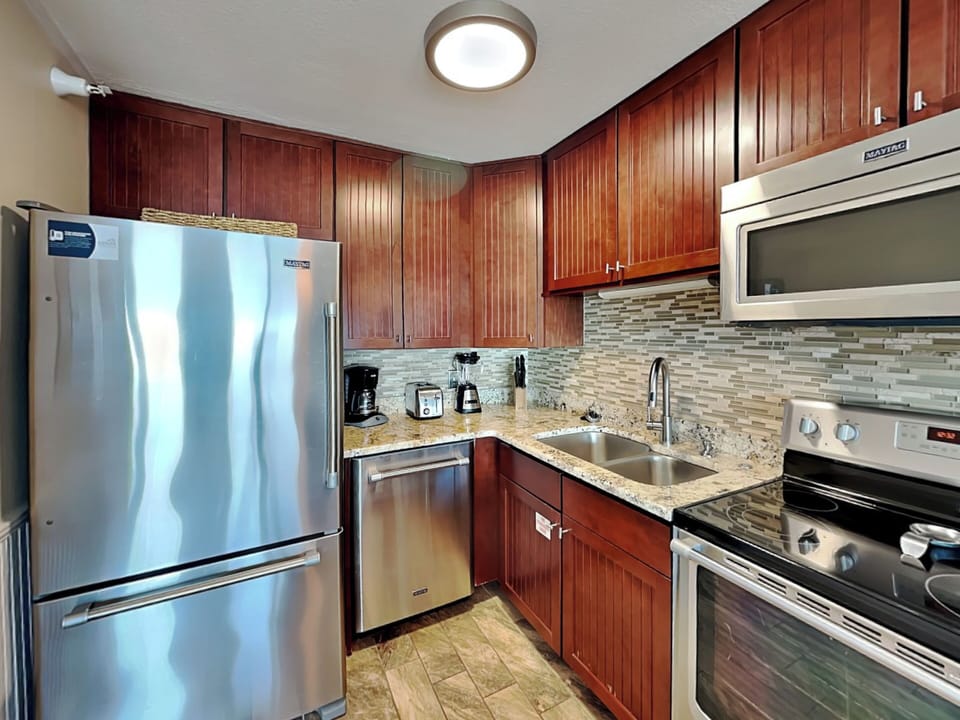 Fully Equipped Kitchen with Stainless Steel Appliances