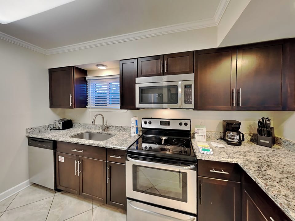 Fully Equipped Kitchen with Stainless Steel Appliances