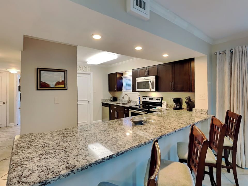 Fully Equipped Kitchen with Stainless Steel Appliances