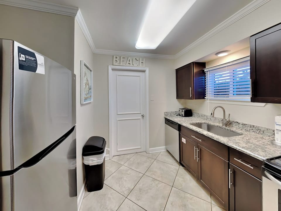 Fully Equipped Kitchen with Stainless Steel Appliances