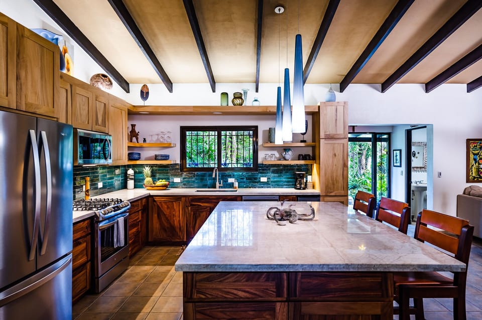 The inner chef in you will dazzle in the gourmet kitchen. 1/2 bath near front.