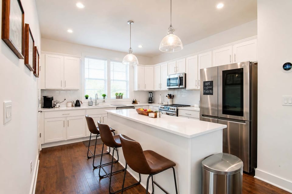 Prepare your favorite meals in the spacious kitchen, designed for easy cooking and gathering.