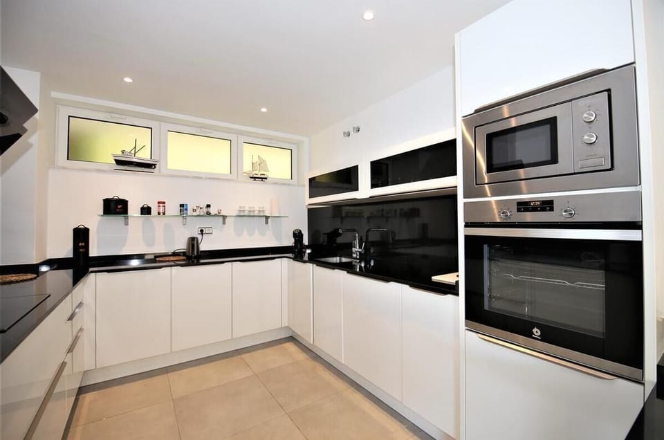 Modern kitchen is fully equipped with all quality appliances