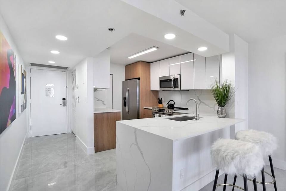 Front door, fully equipped kitchen