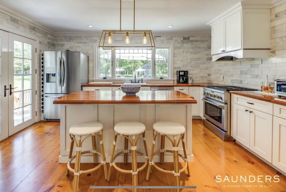 Eat in kitchen overlooking patio and pool 