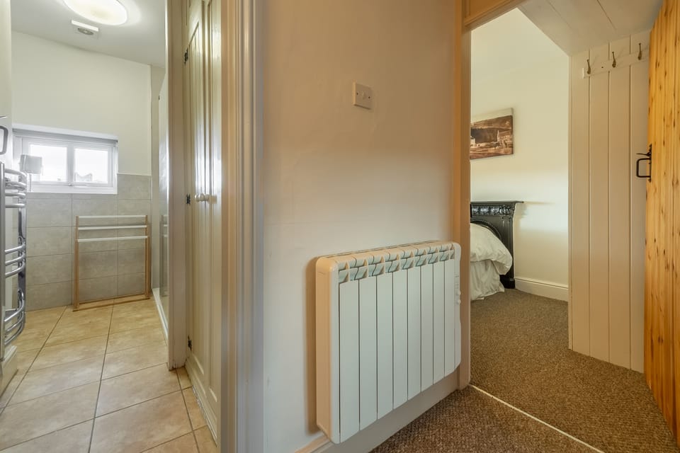 First floor: Master bedroom and shower room from hallway