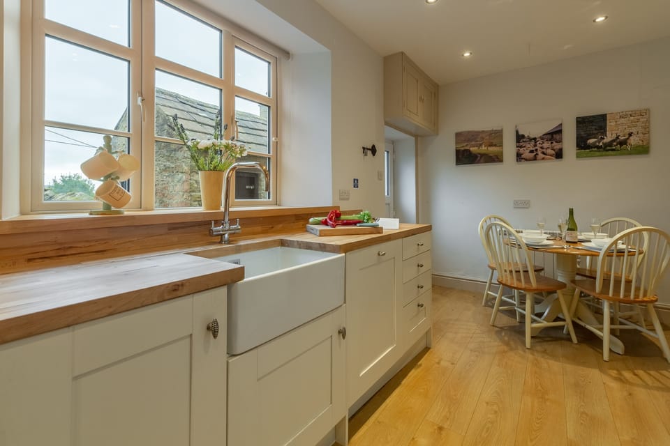Ground floor: Kitchen with Belfast sink overlooking the local countryside