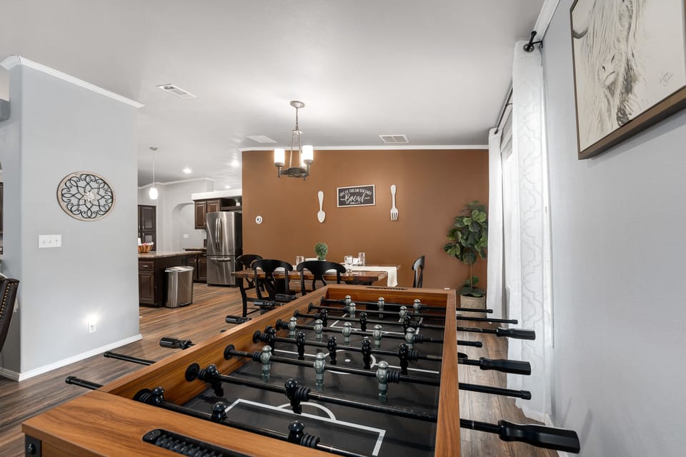 Den | Foosball Table | Dining Area