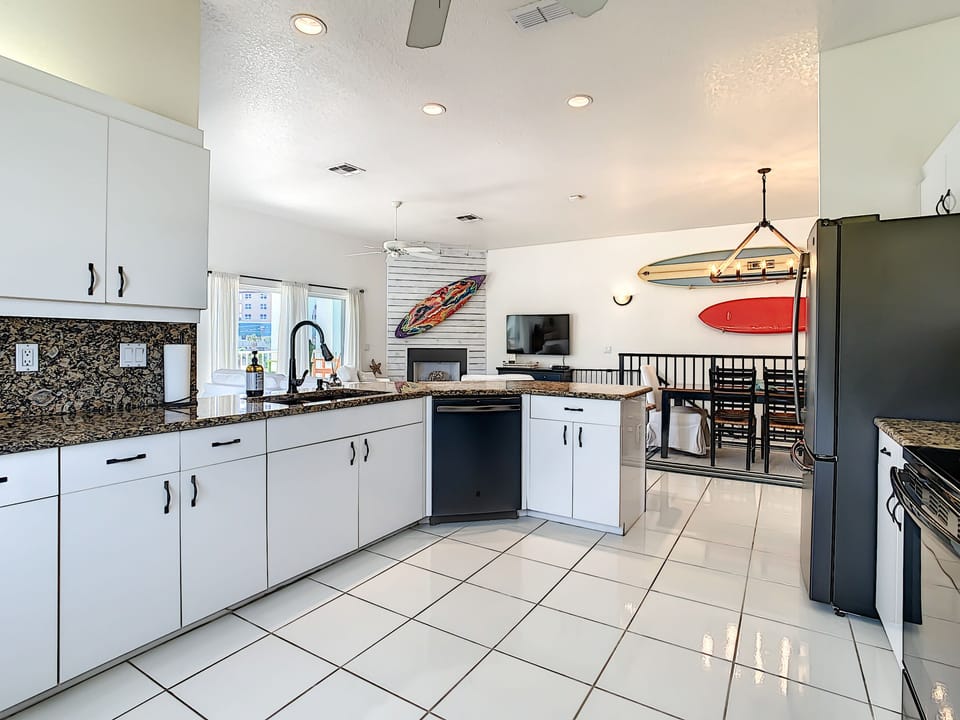 Kitchen with a refrigerator and counters