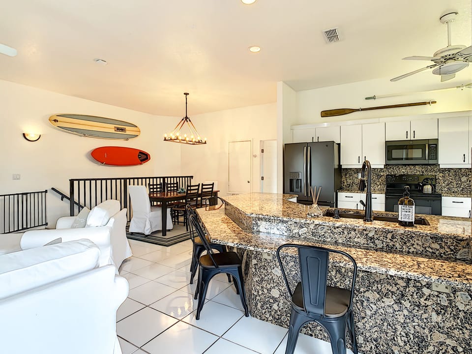Additional seating at the kitchen counter.