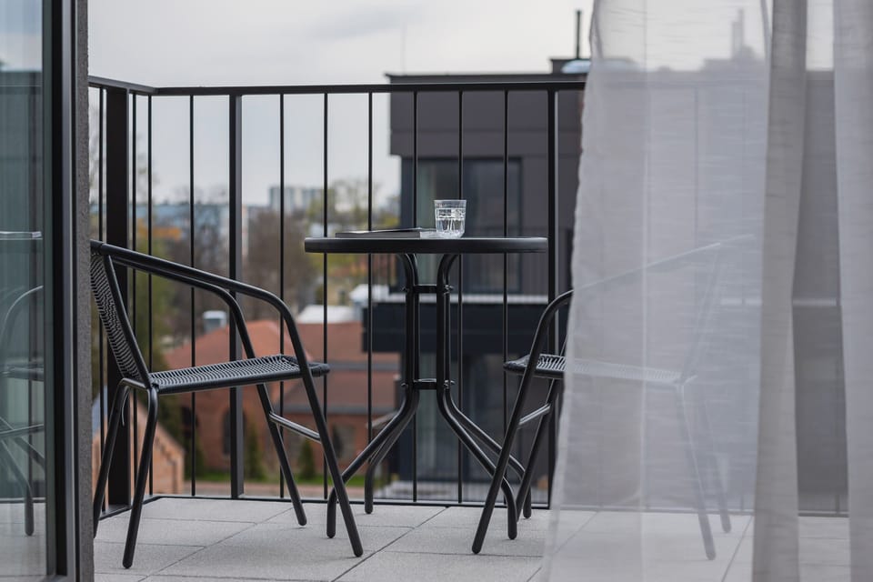 The balcony offers a private retreat with scenic views of the area.
