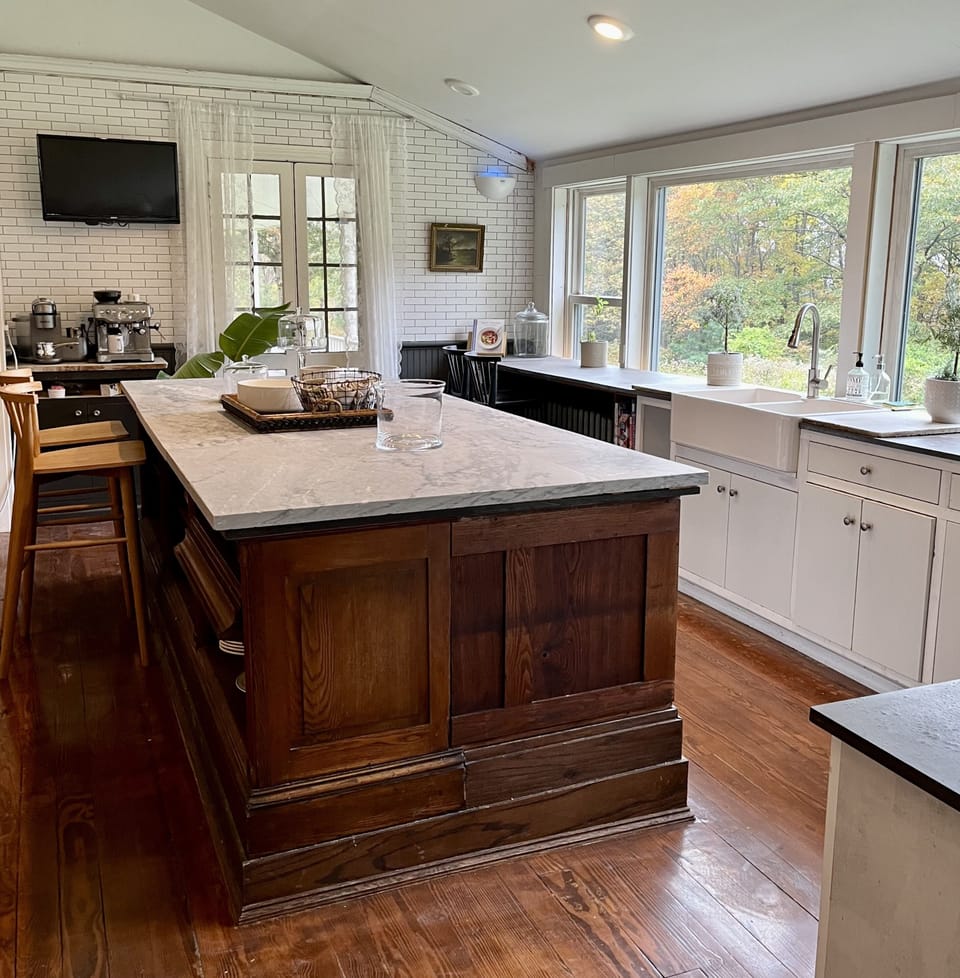 The kitchen opens directly onto the porch.