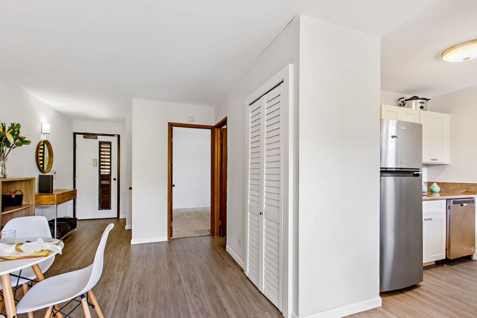 Wood flooring in living room and kitchen