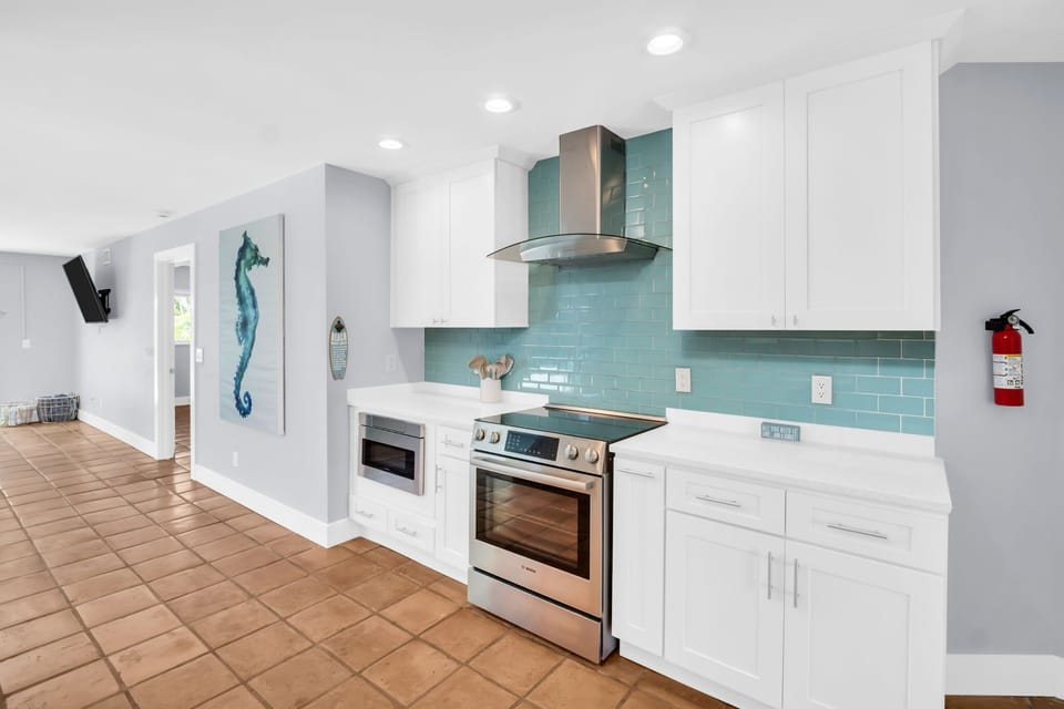 Kitchen: Cook up memories in this bright, stylish kitchen with trendy tile and modern appliances!
