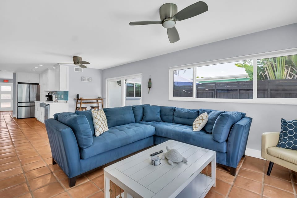 Living Room: Stylish space with large windows, vibrant decor, and seamless indoor-outdoor flow!