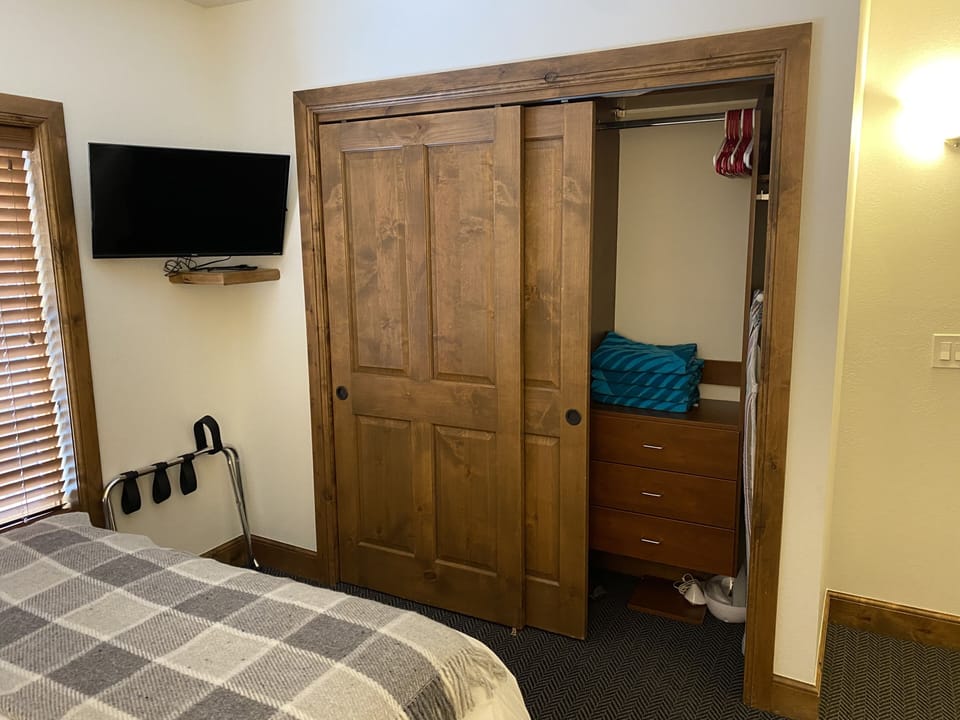 Guest bedroom closet and TV