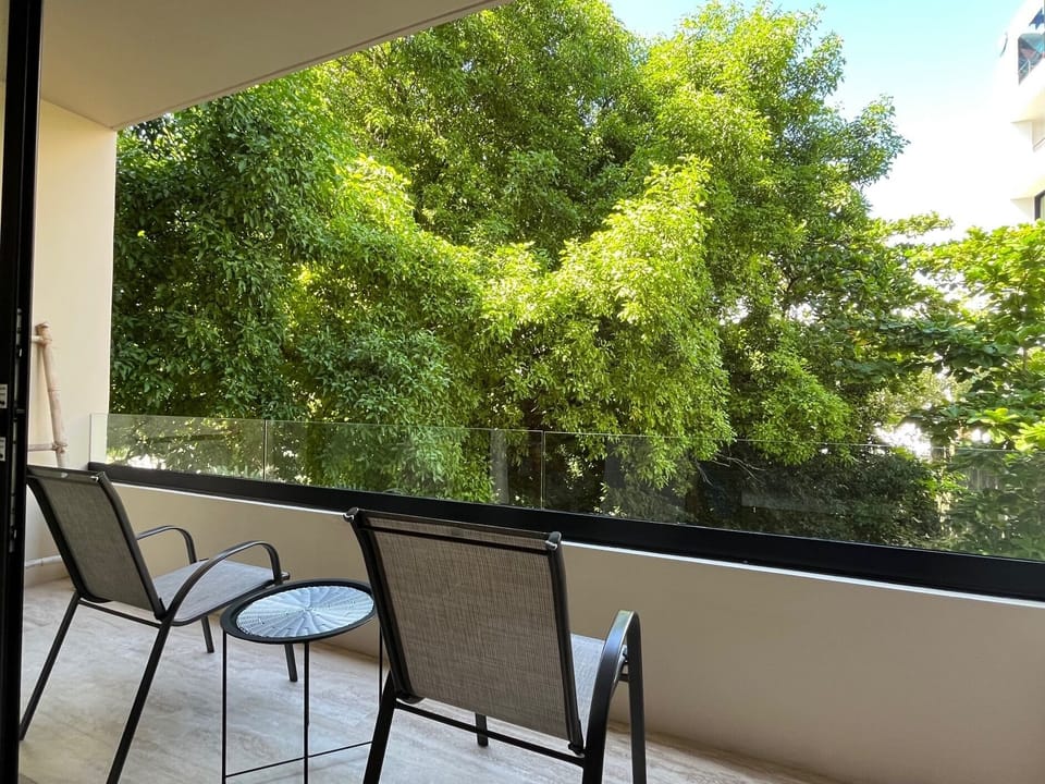 Balcony overlooking green area