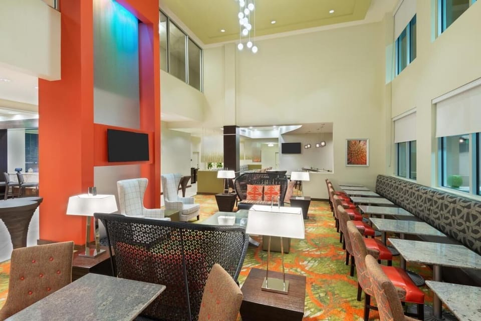 Gather and relax in the stylish lounge with soaring ceilings.