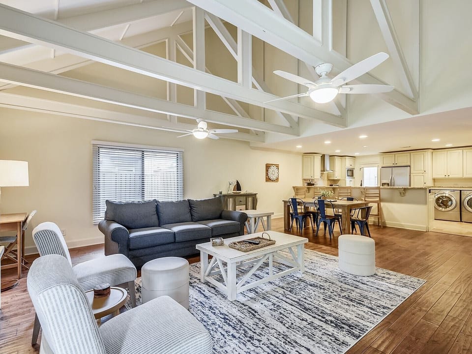 Living Room, Dining Area and Kitchen at 652 Queens Grant