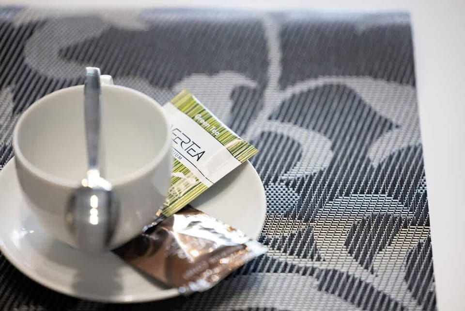 Living room of Szczecińska 23/26 apartment with sofa and TV