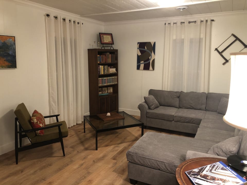 Living room to hang out with family and friends. Play some records?
