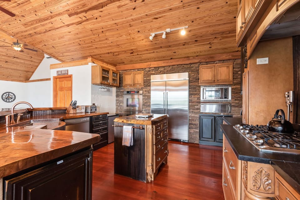 "The kitchen(s) were the best appointed ones I have experienced in a rental: Every pot, pan, baking pan, bowl, etc. you could ever need, double ovens, and even a warmer and pot filler!" April 2024