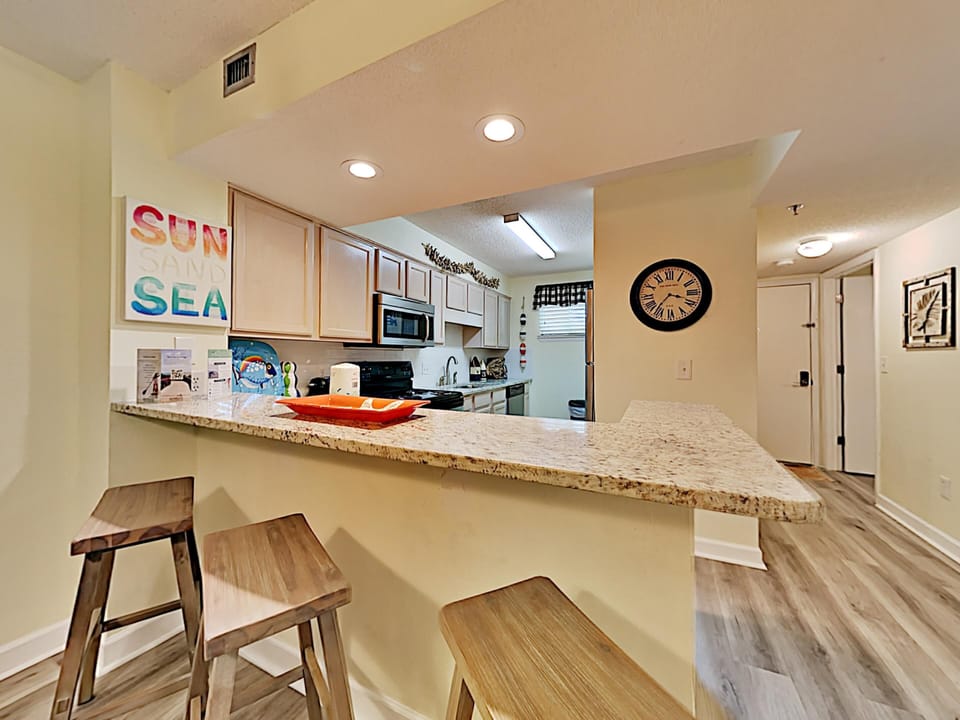 Bar Seating and Kitchen