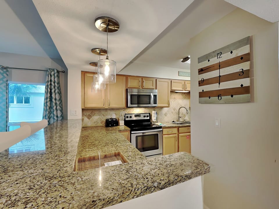 Fully Equipped Kitchen with Stainless Steel Appliances