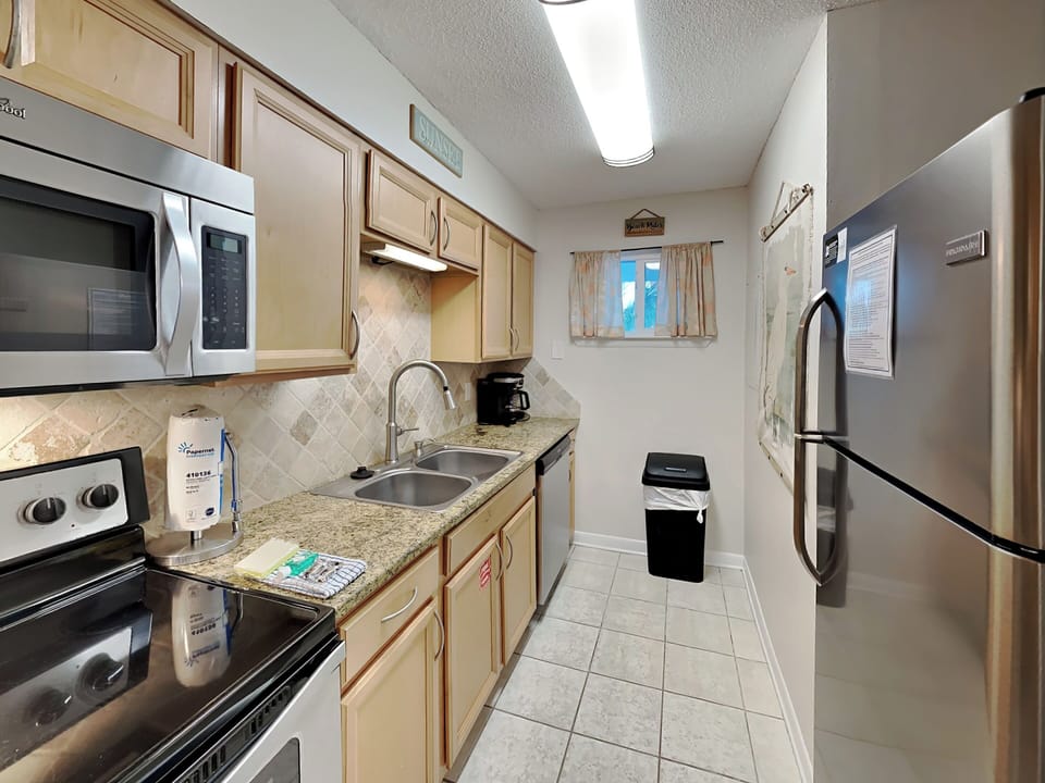 Fully Equipped Kitchen with Stainless Steel Appliances