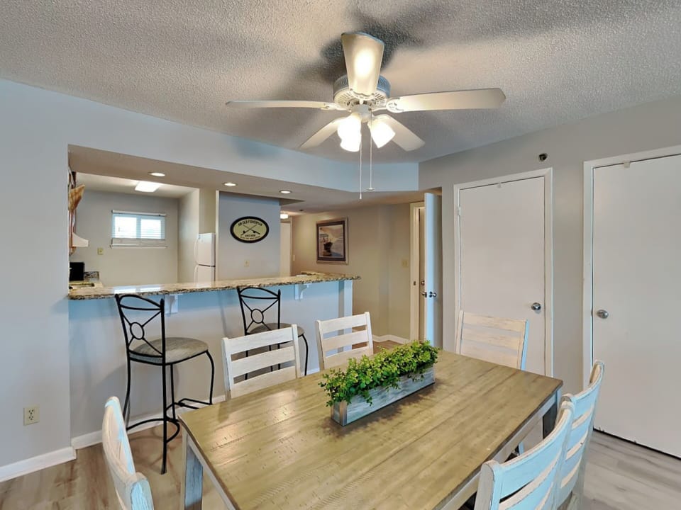 Dining Area - Table for Six and Bar Seating for Two