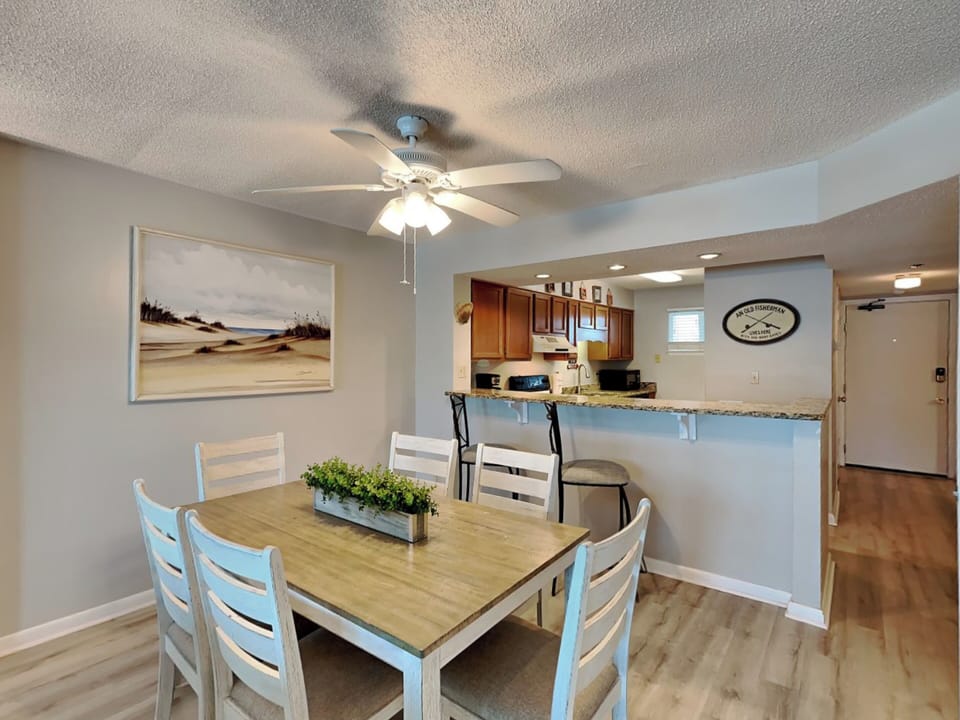 Dining Area - Table for Six and Bar Seating for Two