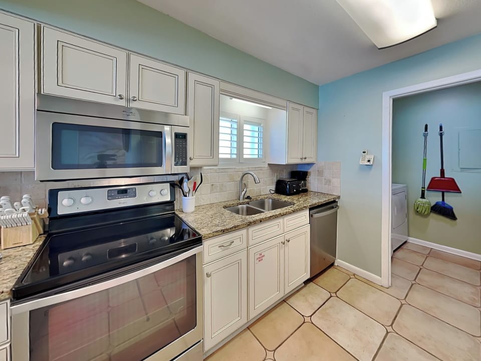 Fully Equipped Kitchen with Stainless Steel Appliances