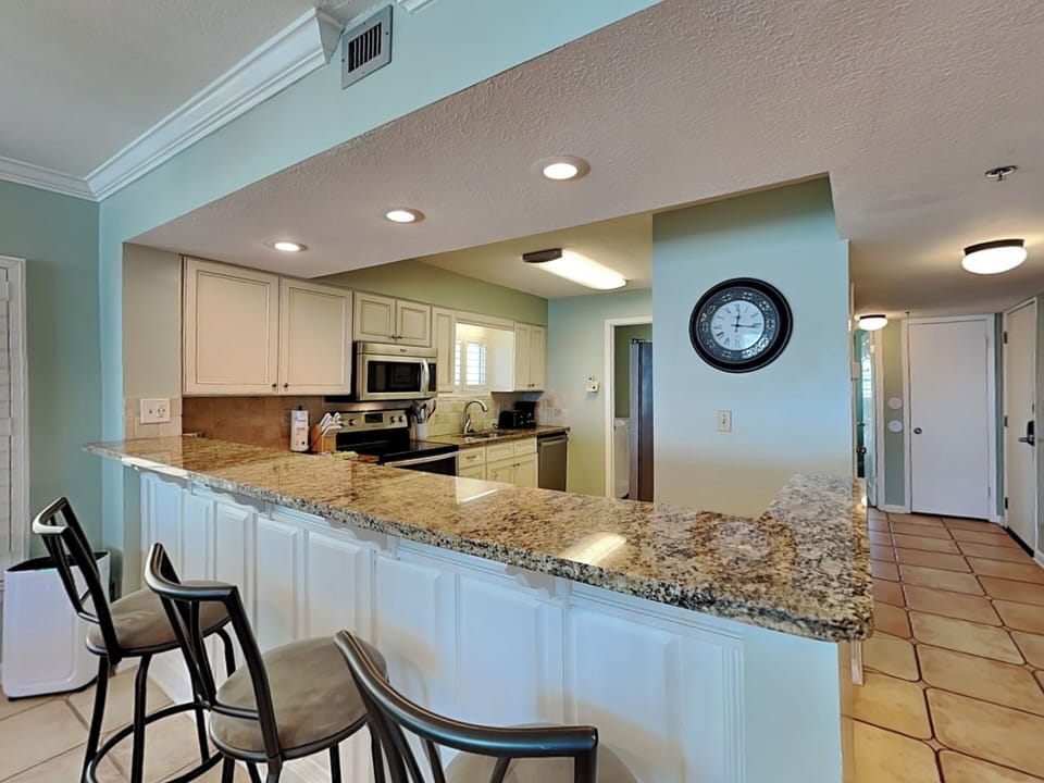 Fully Equipped Kitchen with Bar Seating