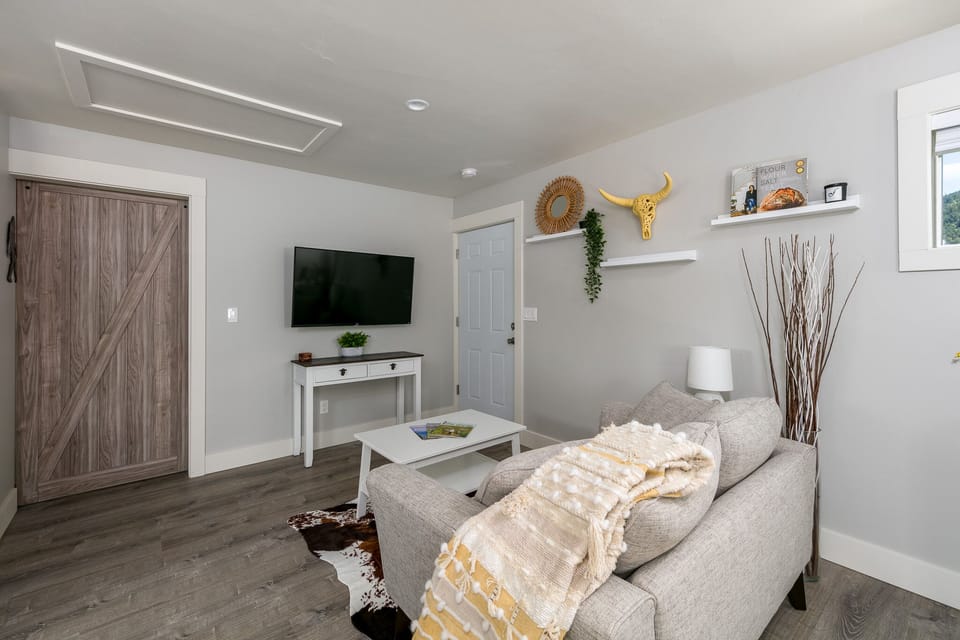 Comfy loveseat with 50" smart 4K TV