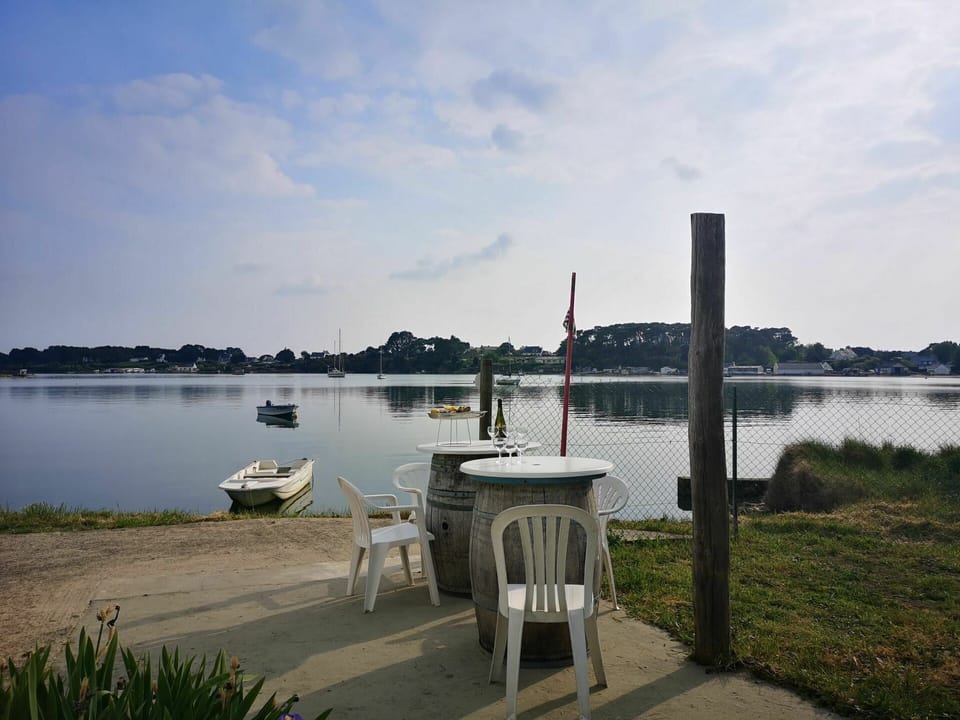 Cloud, Water, Sky, Water Resources, Plant, Lake, Boat, Outdoor Furniture, Watercraft, Bank