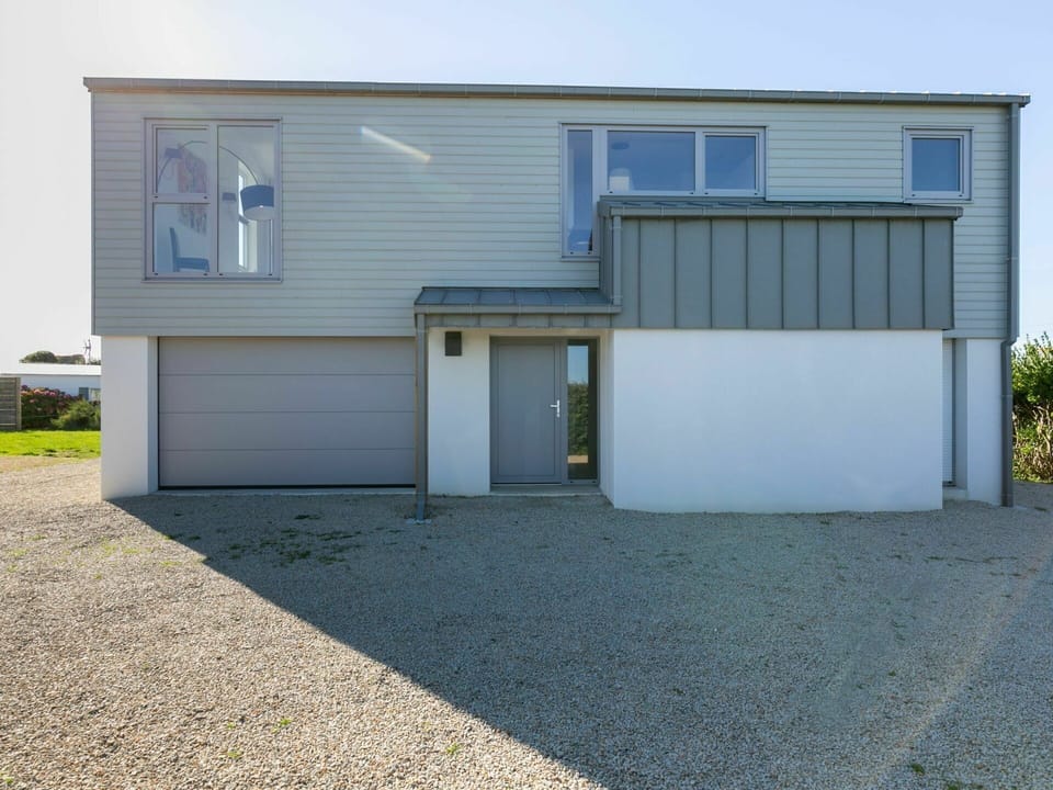Plant, Building, Garage Door, Sky, Road Surface, Shade, Asphalt, Land Lot, Window
