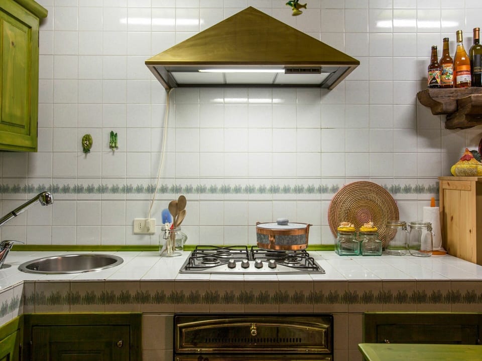 Countertop, Cabinetry, Property, Kitchen Sink, Kitchen, Kitchen Stove, Gas Stove, Kitchen Appliance, Exhaust Hood, Interior Design