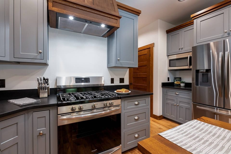 Beautiful modern kitchen with stainless steel appliances.