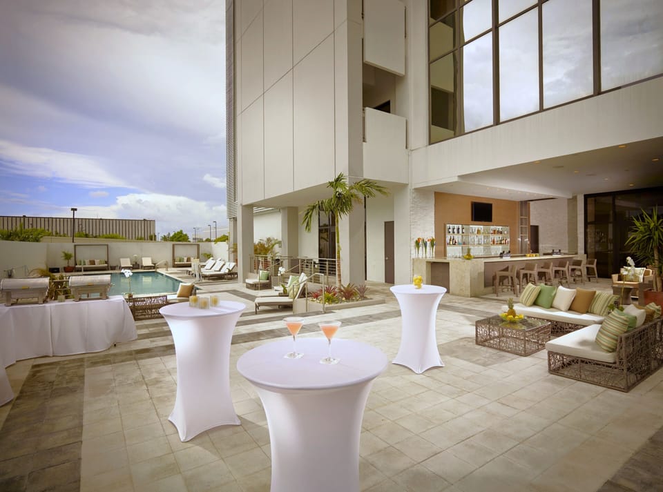 Unwind poolside with chic loungers and sunset cocktails nearby