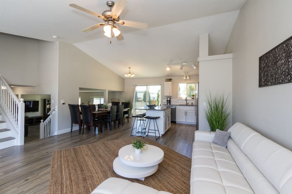 Main floor - encompassing kitchen, dining area, and main Living Room - open to large family room. 