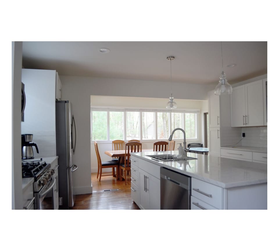 Kitchen looking into Sunroom