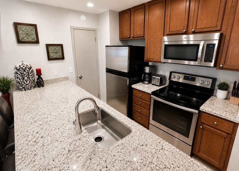 Well appointed and stocked kitchen w/ bar seating for 4