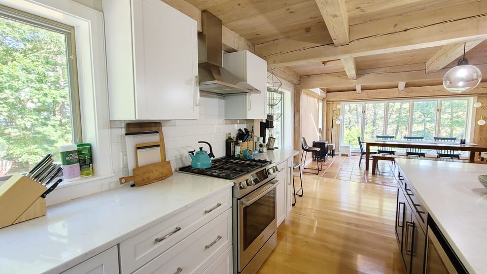Bright kitchen is nicely equipped
